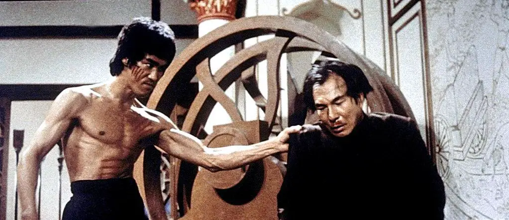 Bruce Lee fighting Mr Han in "Enter The Dragon".